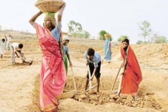 MGNREGA workers celebrating the announcement of wage payments for the strike period