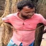 Villagers tie a harassment suspect to a tree in Dhanbad after allegations of assaulting a young woman.