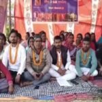 Villagers staging a waterless fast at BCCL Area-3 Gate in Dhanbad, demanding compensation and rehabilitation for mining-related damages.