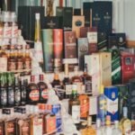 Jharkhand residents celebrating New Year’s Eve with record ₹60 crore liquor sales, Ranchi leading and Jamtara reporting lowest sales.