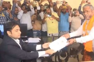 Babilal Marandi files his nomination for the Dhanwar Assembly seat, receiving blessings from his mother.