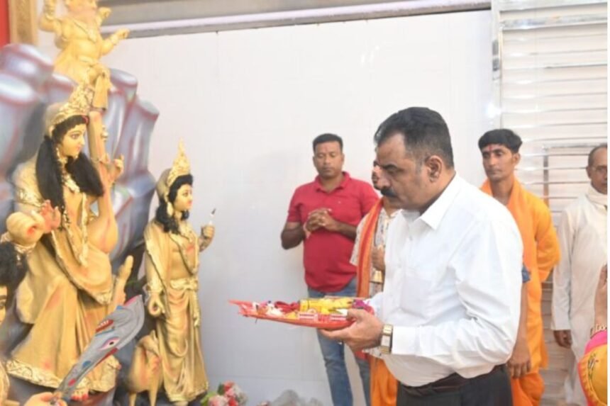 CCL CMD Nilendu Kumar Singh inaugurates the Durga Puja pandal in Gandhinagar, surrounded by community members and CCL officials