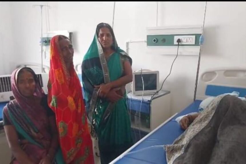 Family members protest outside Parwati Multi Hospital in Giridih after the deaths of a mother and newborn following childbirth.