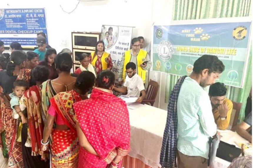 Medical camp organized by Lions Club Ranchi Life in collaboration with Paras Hospital, providing free health services to local residents.