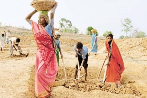 MGNREGA workers celebrating the announcement of wage payments for the strike period