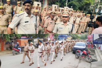 Ranchi police conducting a flag march to promote peaceful voting ahead of the assembly elections.