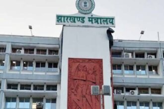 Jharkhand state employees verifying health insurance applications with officials