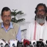 Arvind Kejriwal and Hemant Soren during a press conference in Delhi, confirming attendance at Jharkhand's oath ceremony.