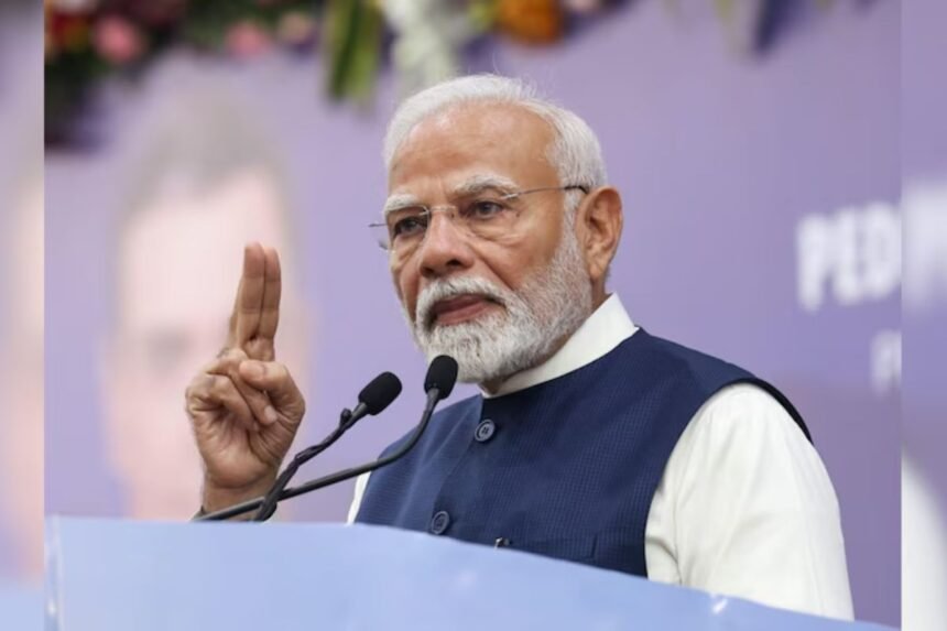 PM Modi addressing supporters during his roadshow in Ranchi on November 10, with heavy security presence