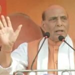 Rajnath Singh addressing an election rally in Ranchi, Jharkhand, highlighting BJP's development plans and commitment to tribal welfare.