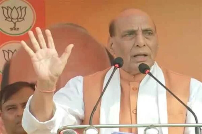 Rajnath Singh addressing an election rally in Ranchi, Jharkhand, highlighting BJP's development plans and commitment to tribal welfare.