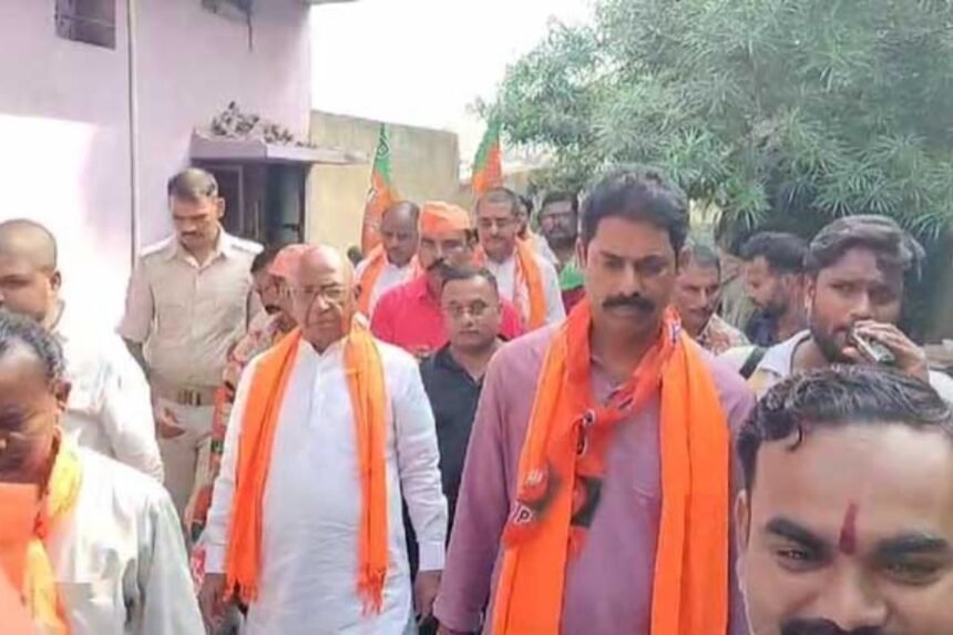 Saryu Roy, JDU candidate, engaging with voters during his campaign tour in Jamshedpur.