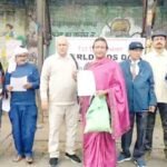 Participants at the AIDS awareness program in Jamshedpur, organized by SP Foundation, highlighting HIV prevention tips on World AIDS Day.