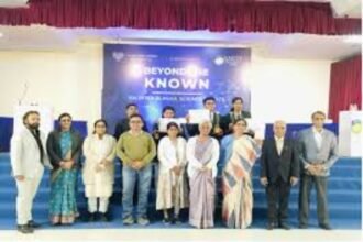 Students participating in the inter-school science debate at Tender Heart School, Ranchi, with judges and audience in attendance.