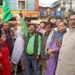 JMM leaders burn effigy of Amit Shah in Deoghar, demanding resignation over controversial remarks on Dr. Ambedkar.