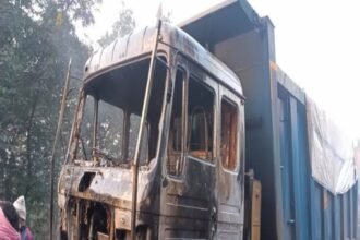 Burnt coal transport truck set ablaze by militants near Bachra Stadium in Piparwar, disrupting NTPC logistics.