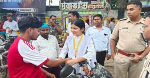 Students tie rakhis to bikers without helmets during a road safety campaign in Latehar