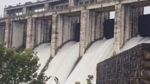 Water being released through open gates of Patratu Dam in Ramgarh