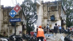 Advertising boards being removed from the Harmu Bypass walkway in Ranchi