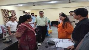 Election officials review voter verification work at an SIR-2026 hearing centre in Ghatshila